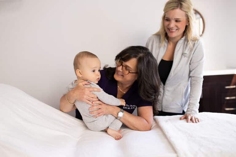 Dr. Kiné Fischler performing fertility acupuncture treatment at Willow Tree Acupuncture clinic in Portland Oregon